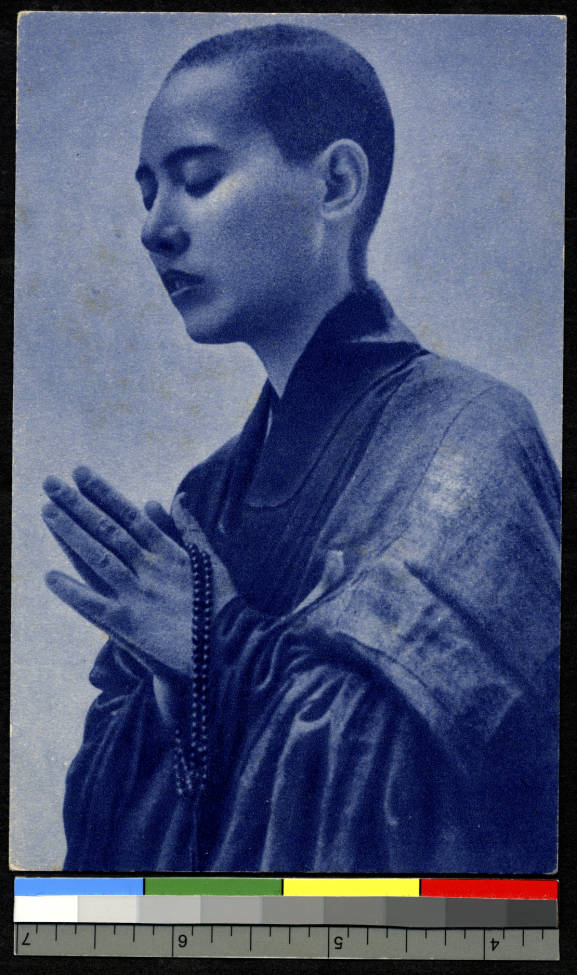 Praying Buddhist monk