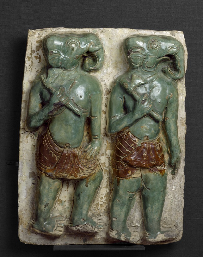 Plaque with elephant-headed warriors